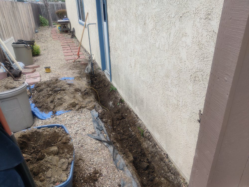 Ron-S.-Tankless-Heater-Exterior-Gas-Line-Trenching.jpg