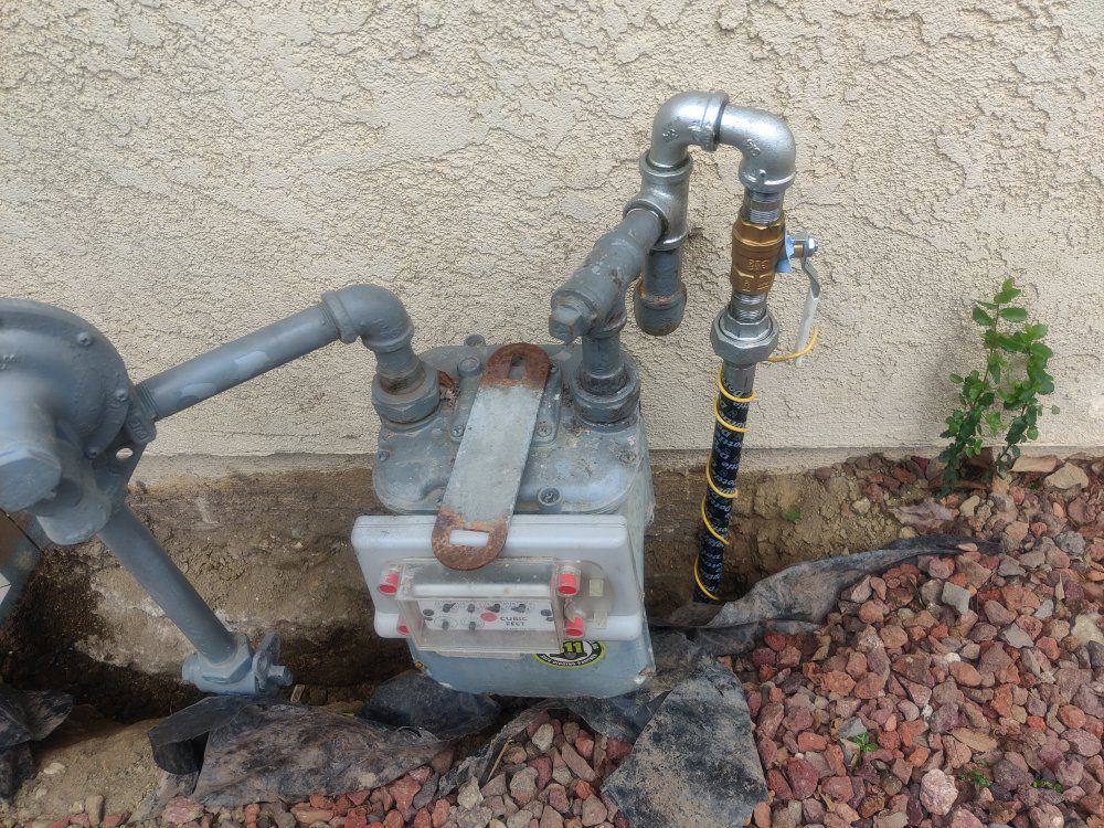 Ron-S.-Tankless-Heater-New-Gas-Line-Meter-Connection.jpg