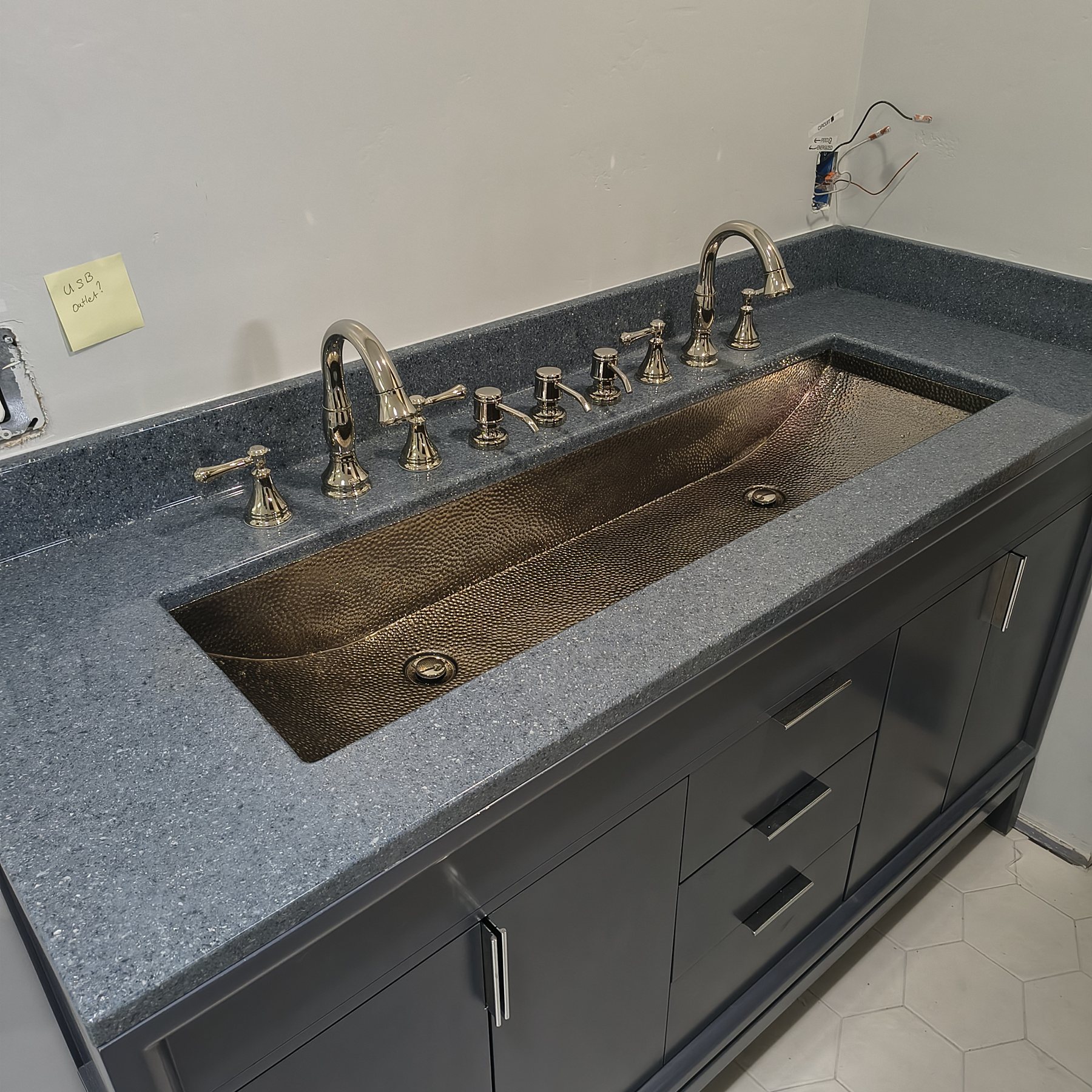 Modern sink and faucet installed in a bathroom vanity