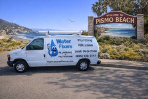 Water Fixers service van near the Pismo Beach welcome sign