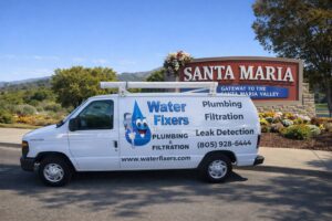 Water Fixers service van near the Santa Maria welcome sign