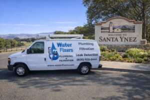 Water Fixers service van near the Santa Ynez welcome sign