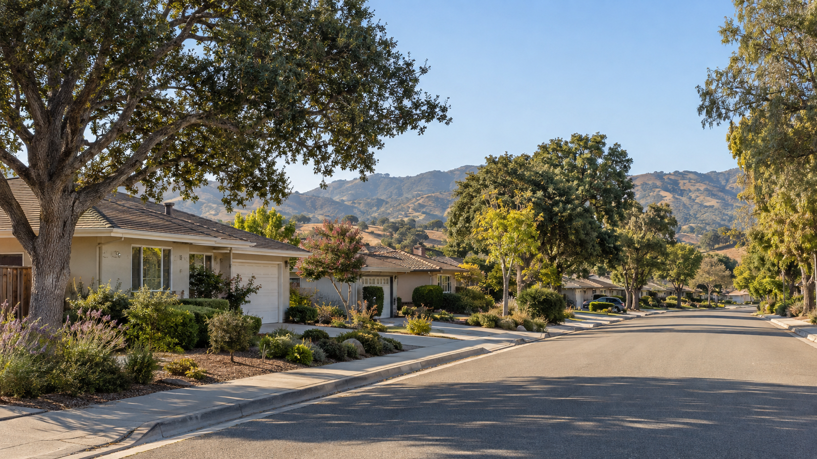 Residential street in Buellton with mature trees and Santa Ynez Valley hills